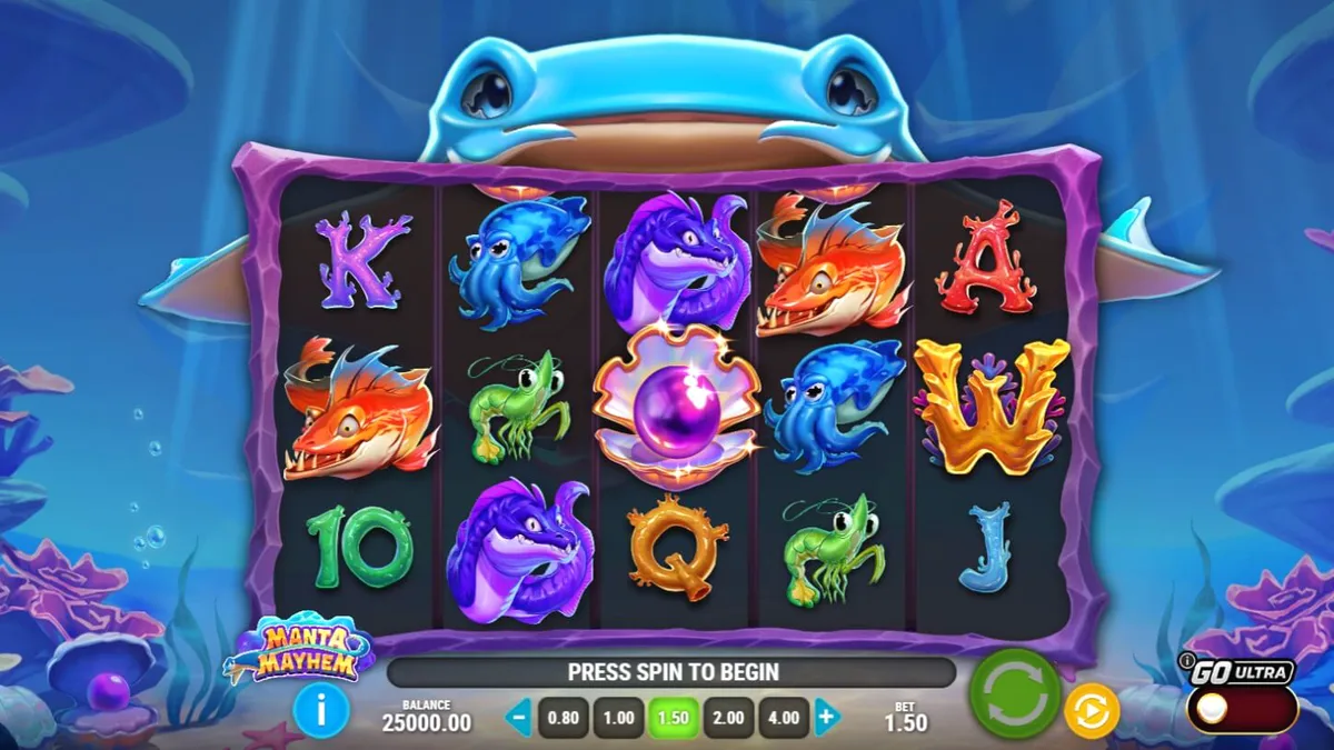 Tampilan visual slot Manta Mayhem dengan latar belakang terumbu karang dan manta ray biru.
